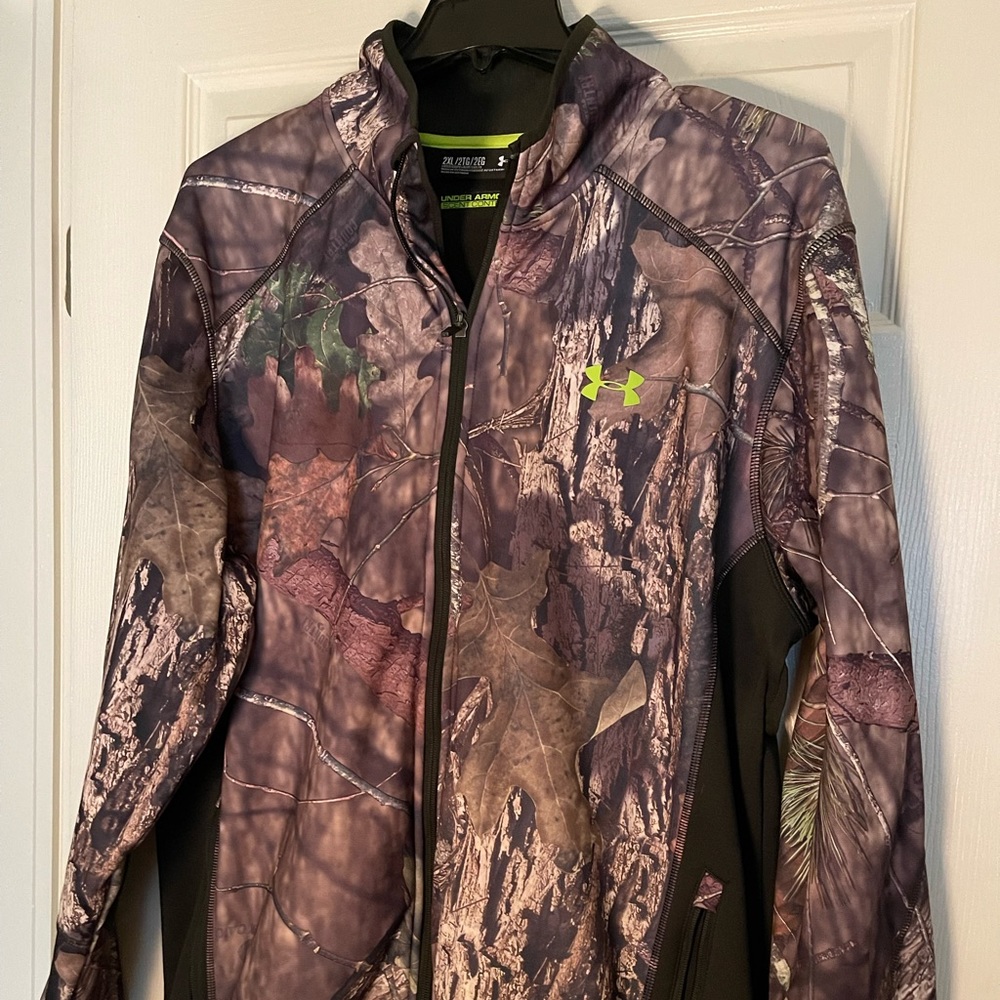 Gently used camouflage Under Armour zip up jacket